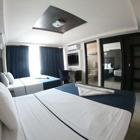 โรงแรมปอร์โตโนโว พลาซา มาเลกอน ปูแอร์โตบาญาร์ตา ภายนอก รูปภาพ